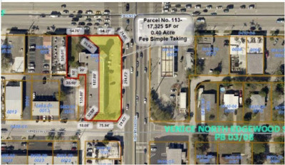 Satellite view of a a commercial retail building & business at a prominent intersection.